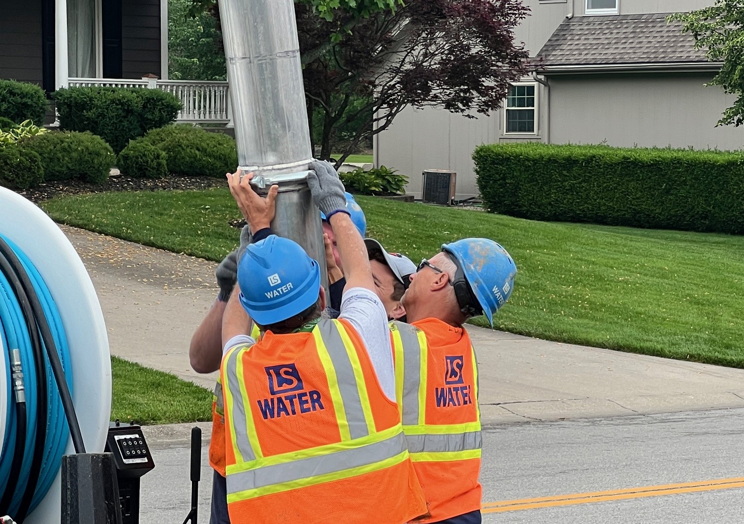 water utilities employees and water truck